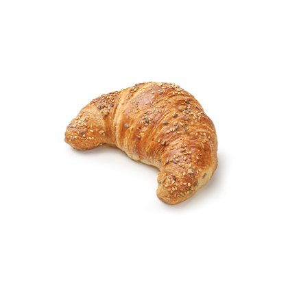 Croissant dorado con semillas variadas, en forma de media luna, sobre fondo blanco.